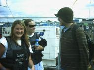 Reading2006_SetA-DomL-d_Jasmine-and-Kerri-Ann_trying-to-buy-his-hat.jpg